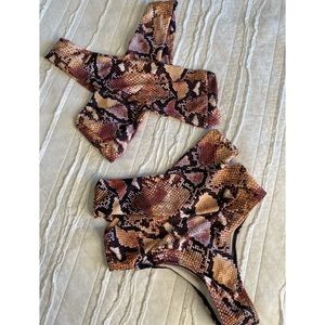 Snakeprint bikini, never worn. Medium top, small bottoms.